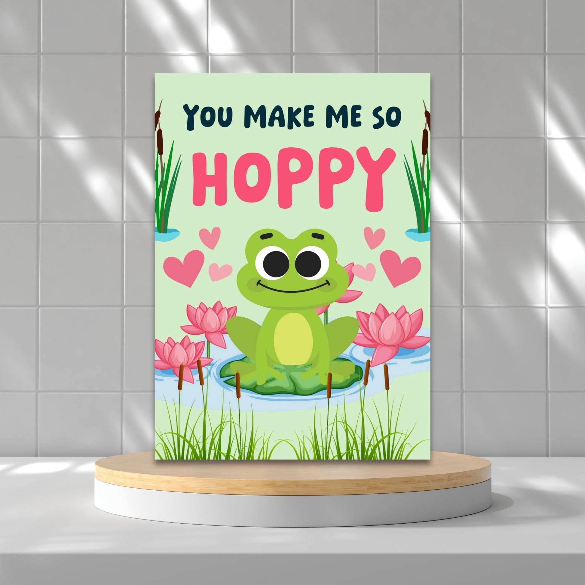 Printable Valentine’s Day Greeting Card featuring the pun “You Make Me So Hoppy.” Designed as a 5x7 PDF on an 8.5 x 11 sheet with two cards per page. A fun and cute Valentine’s card for frog lovers.