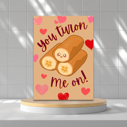 Printable Valentine’s Day card featuring the phrase “You Turon Me On” with an illustration of the Filipino dessert turon. Designed as a 5x7 PDF on an 8.5 x 11 sheet with two cards per page. A punny and culturally inspired Valentine’s card for food lovers.