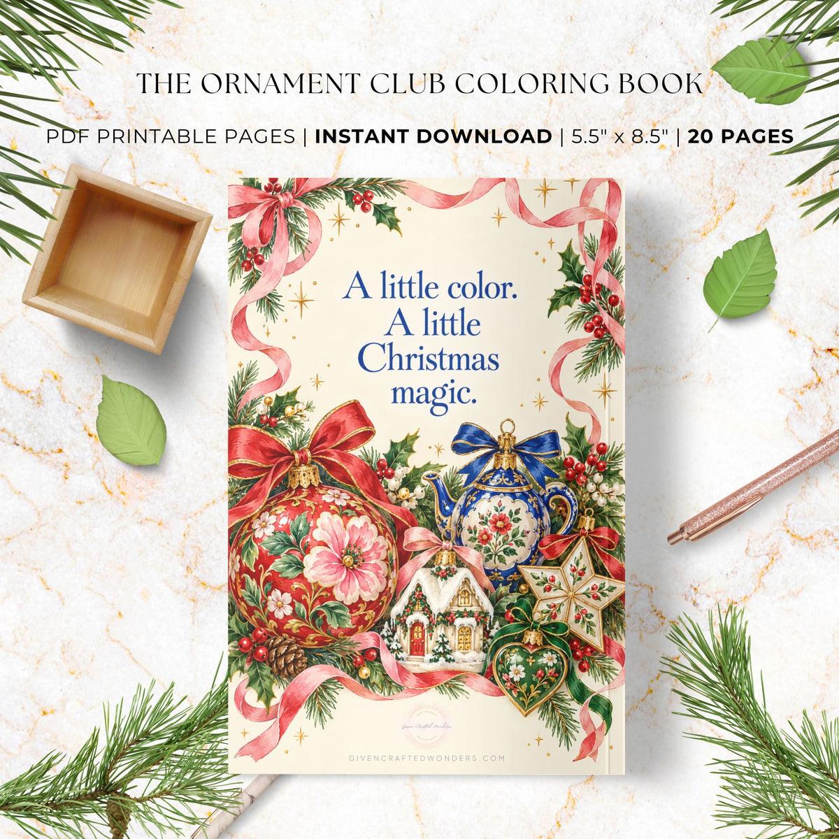 The Ornament Club Coloring Book cover displayed on a marble surface with holiday greenery, a small wooden tray, and a pencil. Text at the top reads 'The Ornament Club Coloring Book' and 'PDF Printable Pages | Instant Download | 5.