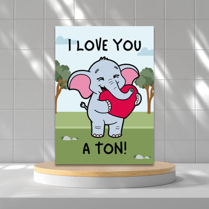 Printable Valentine’s Day Greeting Card featuring the phrase “I Love You a Ton” with an elephant theme. Designed as a 5x7 PDF on an 8.5 x 11 sheet with two cards per page. A cute and heartfelt Valentine’s card for loved ones.