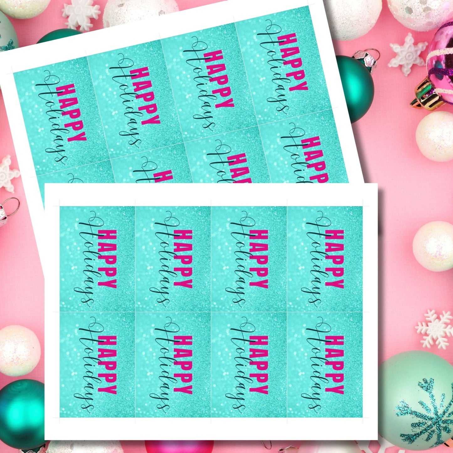 Printable Holiday gift tags featuring an aqua glitter background with bold magenta "Happy Holidays" text and black script accents, sized 2.5 x 3.5 inches, 8 tags per sheet.