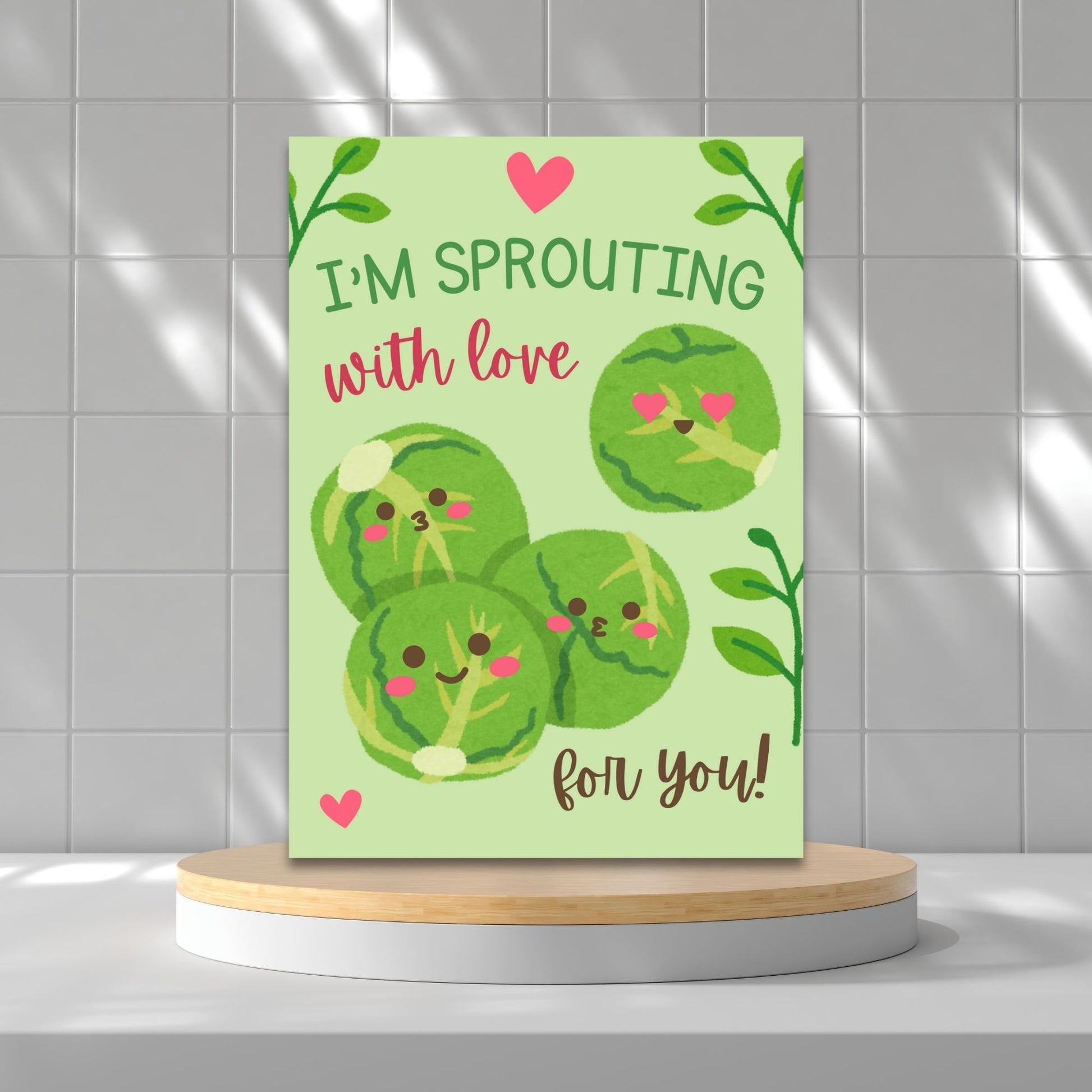 Printable Valentine’s Day Greeting Card featuring the phrase “I’m Sprouting with Love for You” with a cute brussels sprouts illustration. Designed as a 5x7 PDF on an 8.5 x 11 sheet with two cards per page. A fun and punny Valentine’s card for veggie lovers.