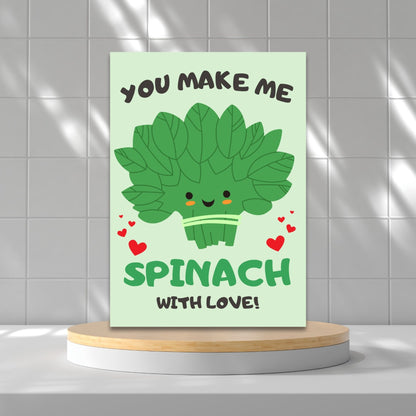 Printable Valentine’s Day Greeting Card featuring the phrase “You Make Me Spinach with Love” with a fun spinach design. Designed as a 5x7 PDF on an 8.5 x 11 sheet with two cards per page. A punny and fresh Valentine’s card for loved ones.