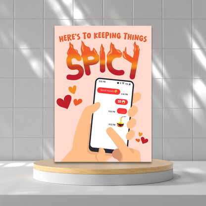 Printable Valentine’s Day Greeting Card featuring the flirty message “Here's to Keeping Things Spicy.” Designed as a 5x7 PDF on an 8.5 x 11 sheet with two cards per page. A fun and cheeky Valentine’s card for couples.