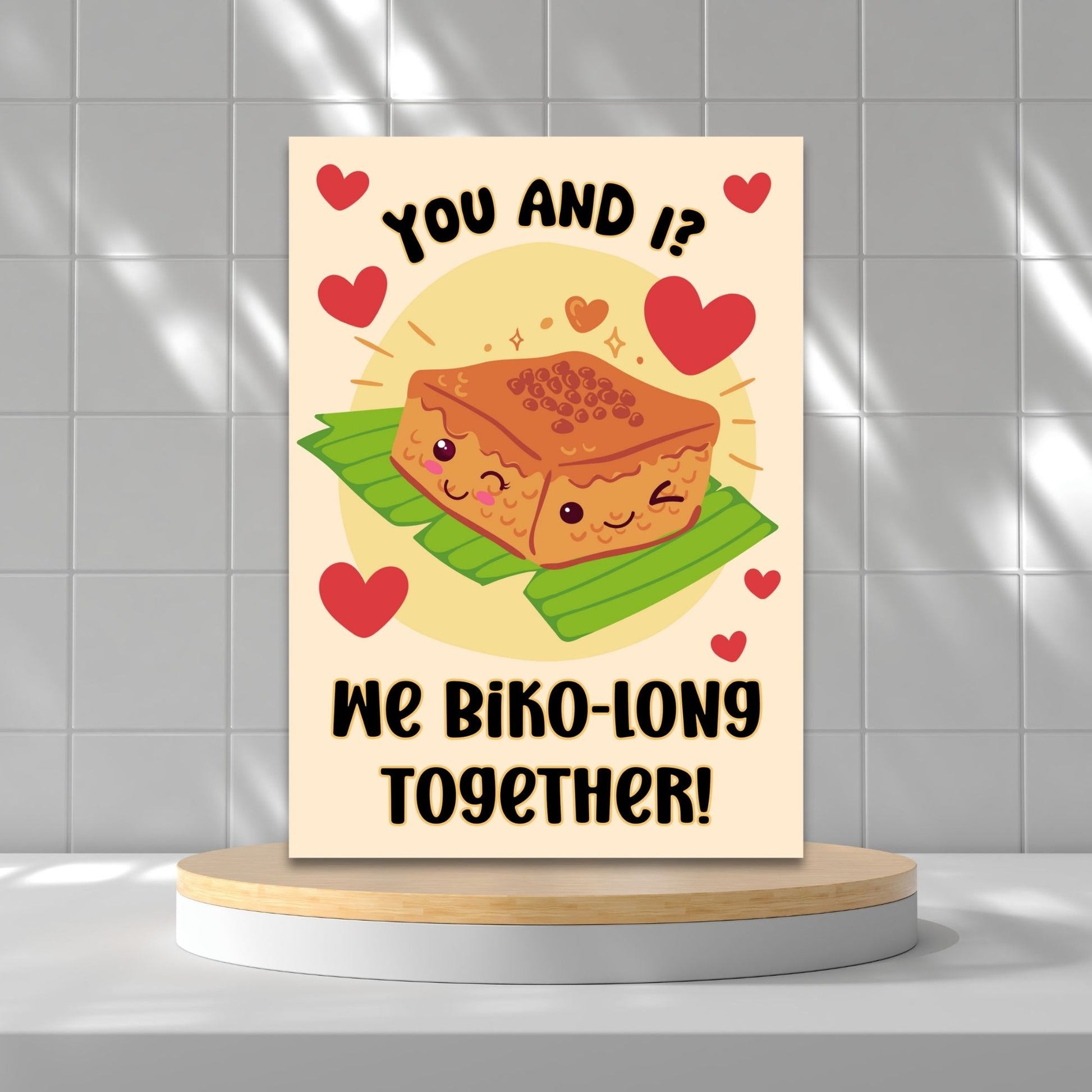 Printable Valentine’s Day card featuring the phrase “You and I, We Biko-long Together” with a Filipino Biko-inspired design. Designed as a 5x7 PDF on an 8.5 x 11 sheet with two cards per page. A punny and heartfelt Valentine’s card for Filipino food lovers.