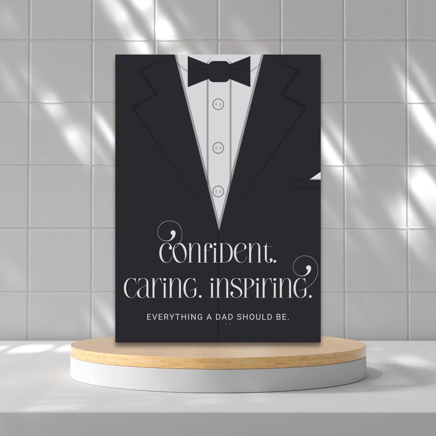 Father's Day card printable with bold text 'Confident. Caring. Inspiring.' featuring a minimalist design of a suit and tie in grayscale tones.