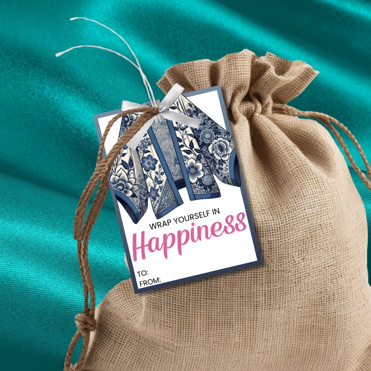 Printable kimono gift tags featuring a colorful kimono design with the text "Wrap Yourself in Happiness" and customizable space for names, perfect for adding a personal touch to any gift.