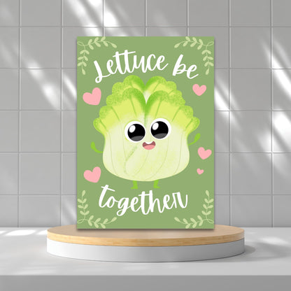 Printable Valentine’s Day Greeting Card featuring the phrase “Lettuce Be Together” with a fun lettuce design. Designed as a 5x7 PDF on an 8.5 x 11 sheet with two cards per page. A punny and fresh Valentine’s card for loved ones.