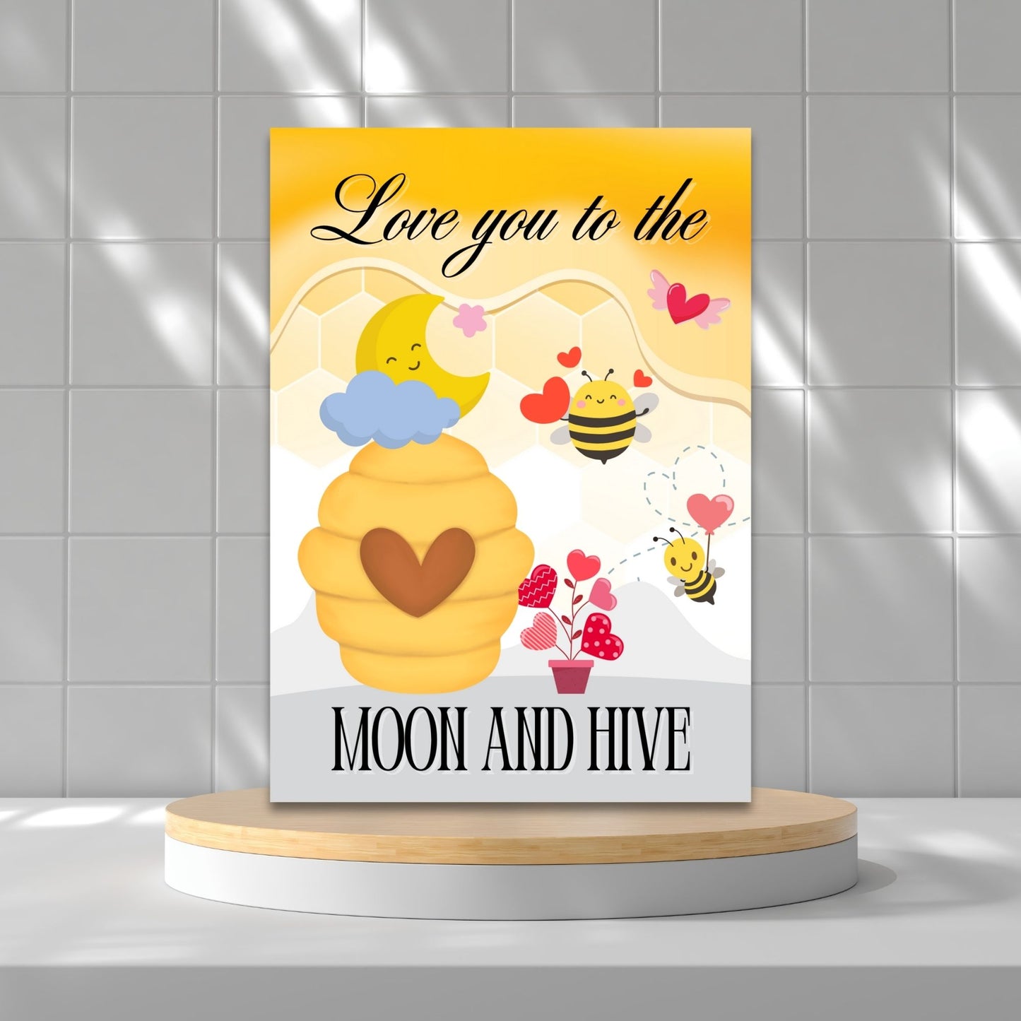 Printable Valentine’s Day card featuring the phrase “Love You to the Moon and Hive” with a bee and moon design. Designed as a 5x7 PDF on an 8.5 x 11 sheet with two cards per page. A punny and heartfelt Valentine’s card for loved ones.