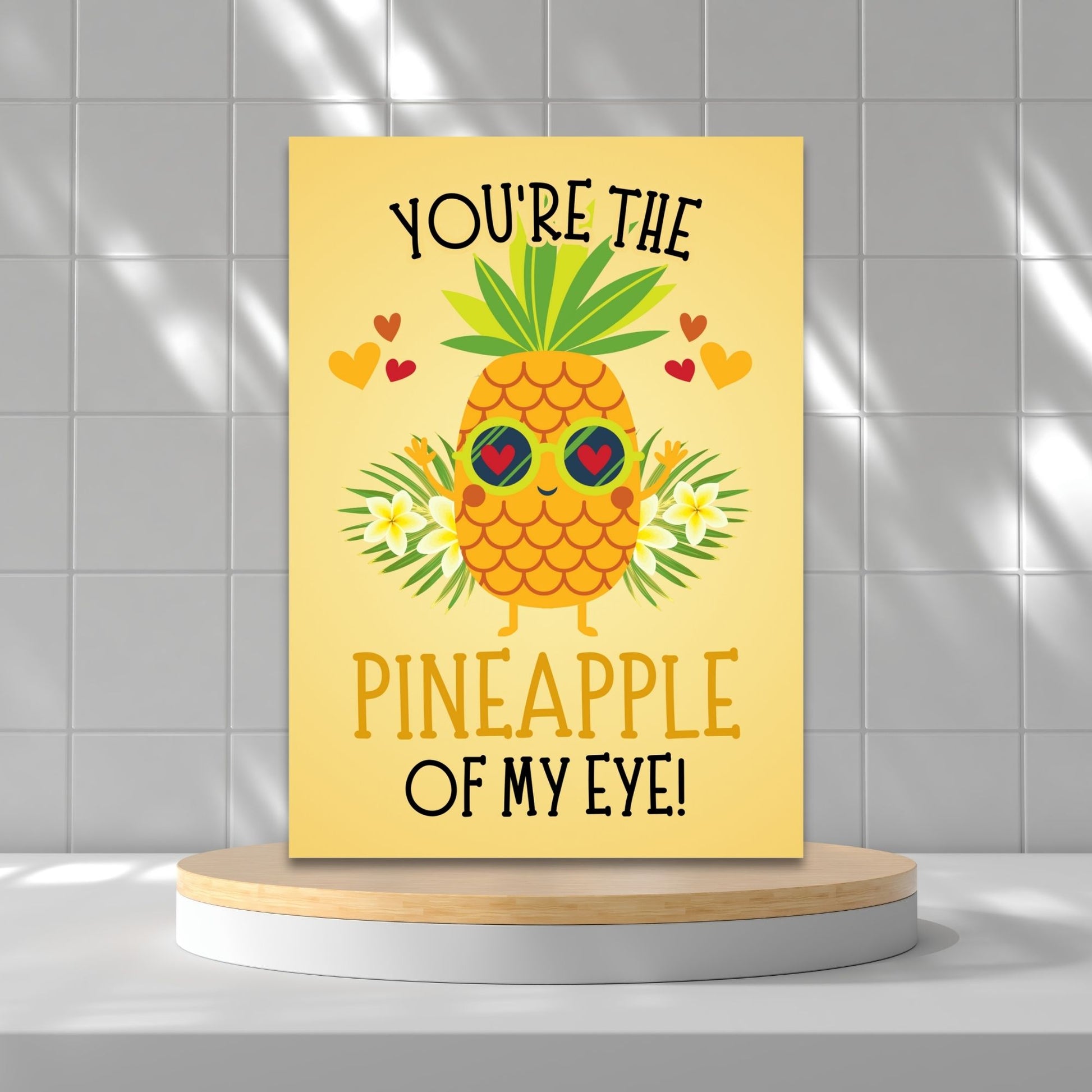 Printable Valentine’s Day Greeting Card featuring the phrase “You’re the Pineapple of My Eye” with a cheerful pineapple theme. Designed as a 5x7 PDF on an 8.5 x 11 sheet with two cards per page. A fun and tropical Valentine’s card for loved ones.