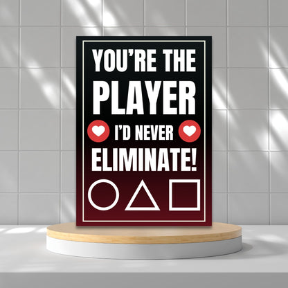 Squid Game-inspired Valentine’s Day card with a player selection theme, perfect for fans. Features bold red, black, and white colors with a playful elimination message.