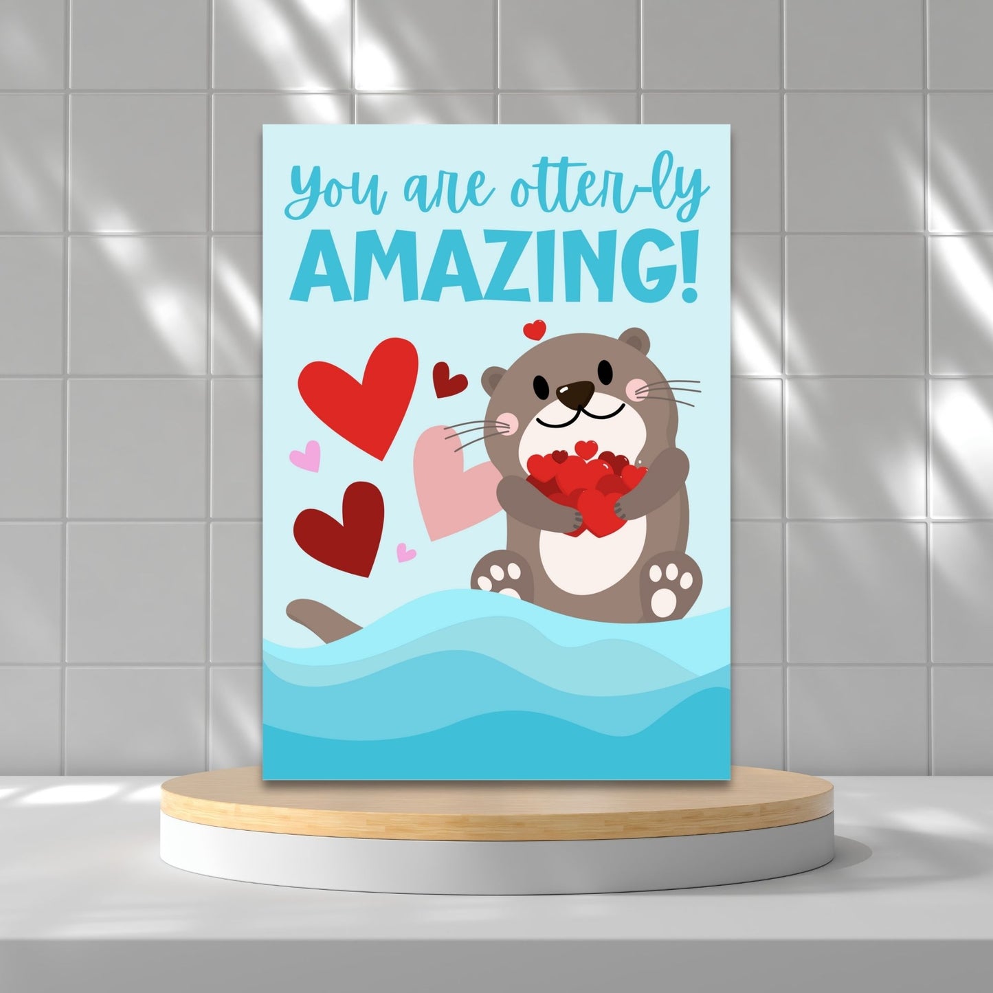 Printable Valentine’s Day Greeting Card featuring the pun “You Are Otterly Amazing.” Designed as a 5x7 PDF on an 8.5 x 11 sheet with two cards per page. A cute and fun Valentine’s card for otter lovers and friends.