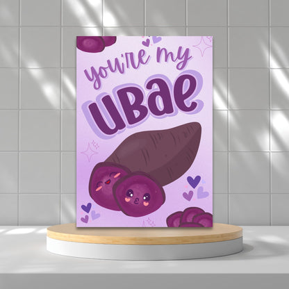 Printable Valentine’s Day card featuring the phrase “You’re My UBAE” with a cute and colorful ube-themed design. Designed as a 5x7 PDF on an 8.5 x 11 sheet with two cards per page. A punny and heartfelt Valentine’s card for ube lovers.