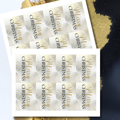 Luxury Christmas gift tags featuring a marble background with gold accents and black "Merry Christmas" typography, sized 2.5 x 3.5 inches, 8 tags per sheet.