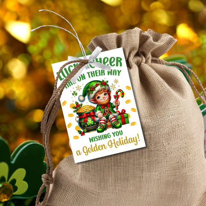 Festive leprechaun-themed holiday gift tags featuring a cheerful elf in a green outfit, surrounded by golden coins, presents, and candy canes. The tag reads 'Luck and Cheer are on Their Way - Wishing You a Golden Holiday!'