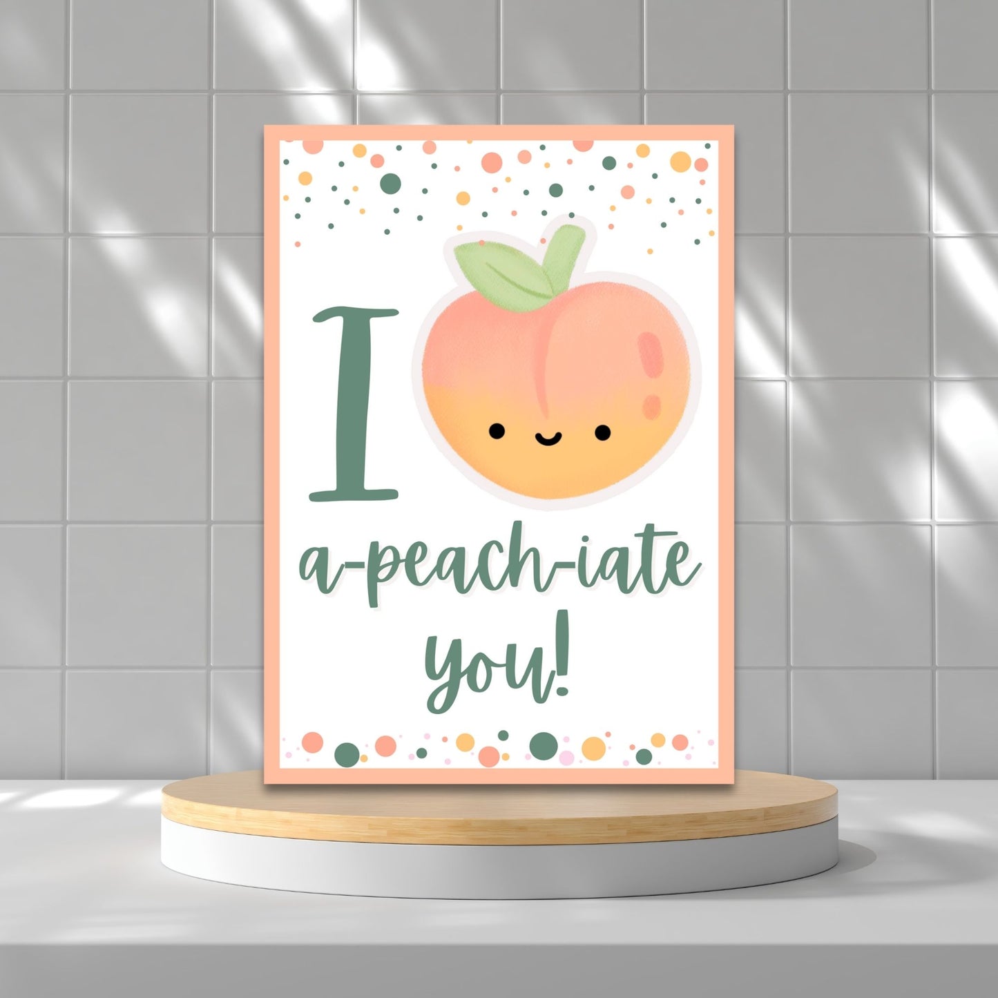 Printable Valentine’s Day Greeting Card featuring the phrase “I APEACHiate You” with a peach illustration. Designed as a 5x7 PDF on an 8.5 x 11 sheet with two cards per page. A fun and punny Valentine’s card for loved ones.