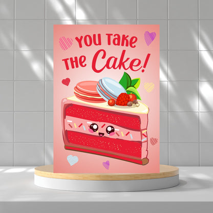 Printable Valentine’s Day card featuring the phrase “You Take the Cake” with a charming dessert design. Designed as a 5x7 PDF on an 8.5 x 11 sheet with two cards per page. A sweet and punny Valentine’s card for loved ones.