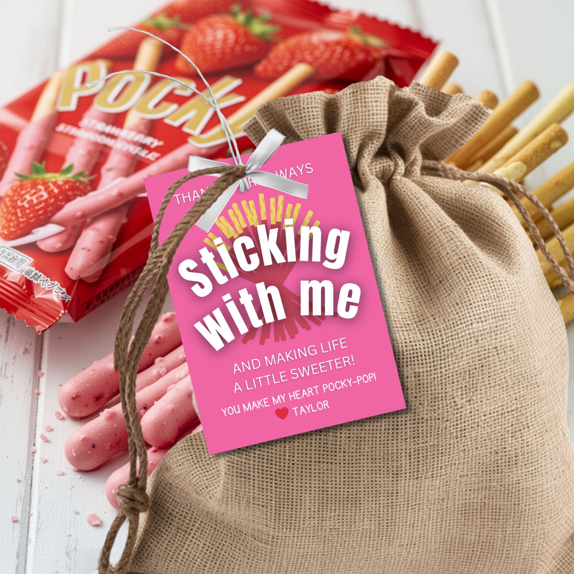 Strawberry Pocky thank you printable gift tags in pink reading “Thanks for Always Sticking With Me and Making Life a Little Sweeter,” 2.5x3.5 inches, 8 per 8.5x11 sheet, editable Canva template included.