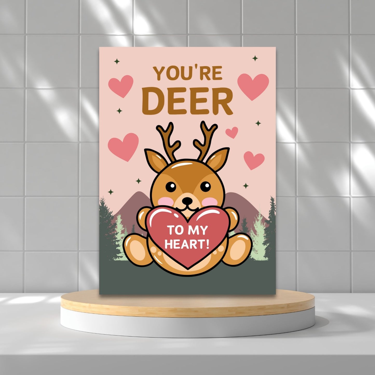 Printable Valentine’s Day Greeting Card featuring the phrase “You’re Deer to My Heart” with a deer illustration. Designed as a 5x7 PDF on an 8.5 x 11 sheet with two cards per page. A heartfelt and punny Valentine’s card for loved ones.