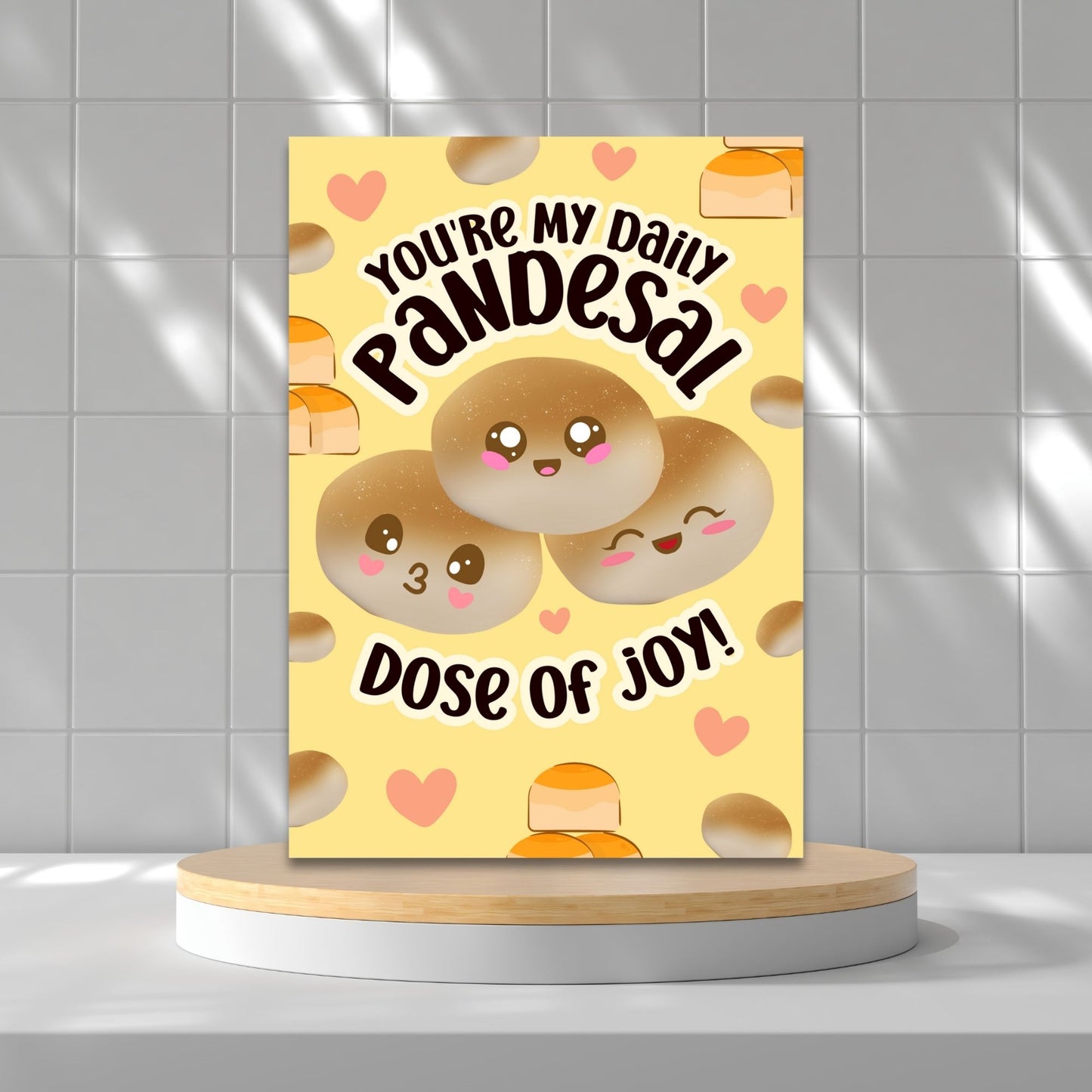 Printable Valentine’s Day card featuring the phrase “You’re My Daily Pandesal Dose of Joy” with a cute and warm pandesal design. Designed as a 5x7 PDF on an 8.5 x 11 sheet with two cards per page. A punny and heartfelt Valentine’s card for Filipino food lovers.