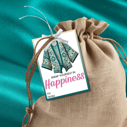 Printable kimono gift tags featuring a colorful kimono design with the text "Wrap Yourself in Happiness" and customizable space for names, perfect for adding a personal touch to any gift.