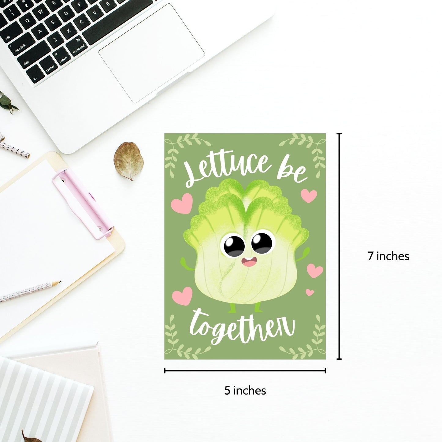 Printable Valentine’s Day Greeting Card featuring the phrase “Lettuce Be Together” with a fun lettuce design. Designed as a 5x7 PDF on an 8.5 x 11 sheet with two cards per page. A punny and fresh Valentine’s card for loved ones.