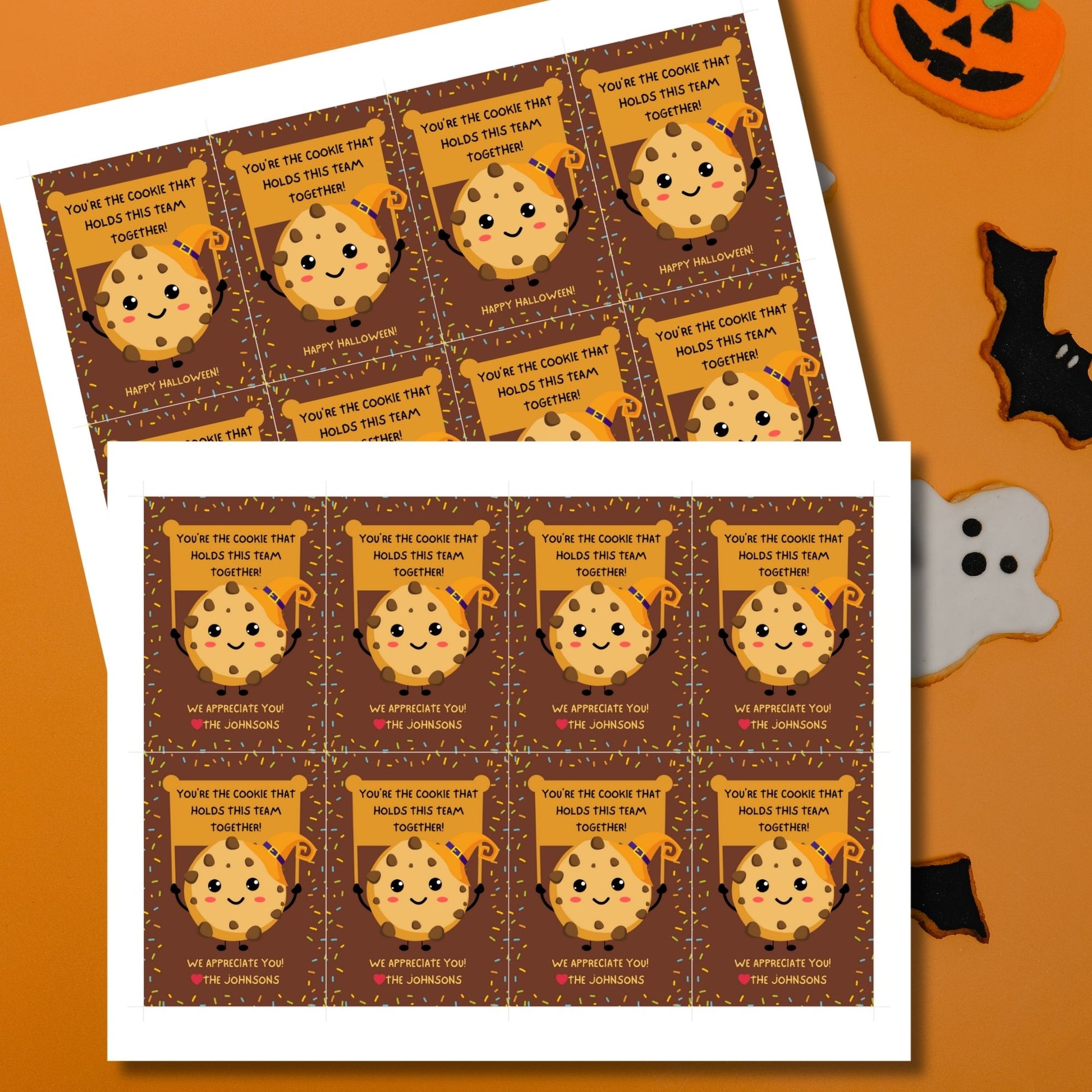 Halloween-themed printable gift tags featuring a cute cookie character in a witch's hat with a sign reading, "You're the cookie that holds this team together!" Tags are 2.5 x 3.5 inches, laid out 8 per sheet on a standard 8.5 x 11-inch page. Includes a printable PDF and a PDF with a link to an editable Canva template.