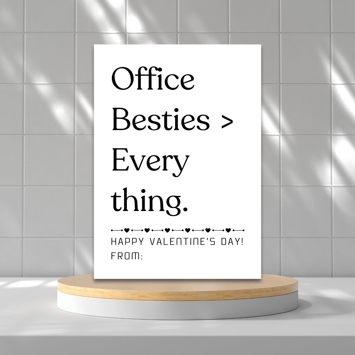 Minimalist black and white printable Valentine card for work besties featuring clean typography and office-friendly appreciation message.