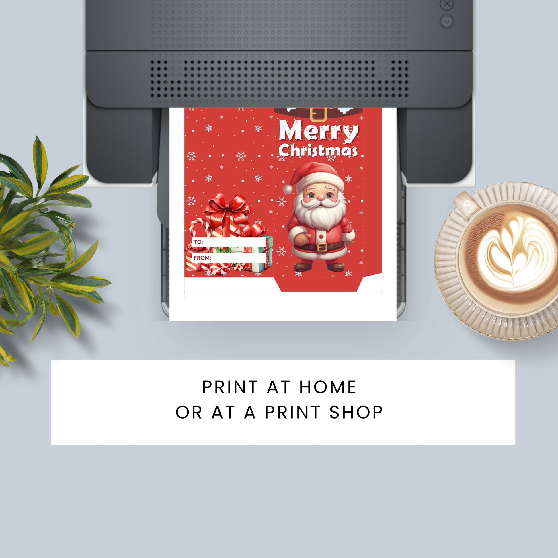Printer with a Christmas-themed print, plant, and coffee cup on a light blue background.