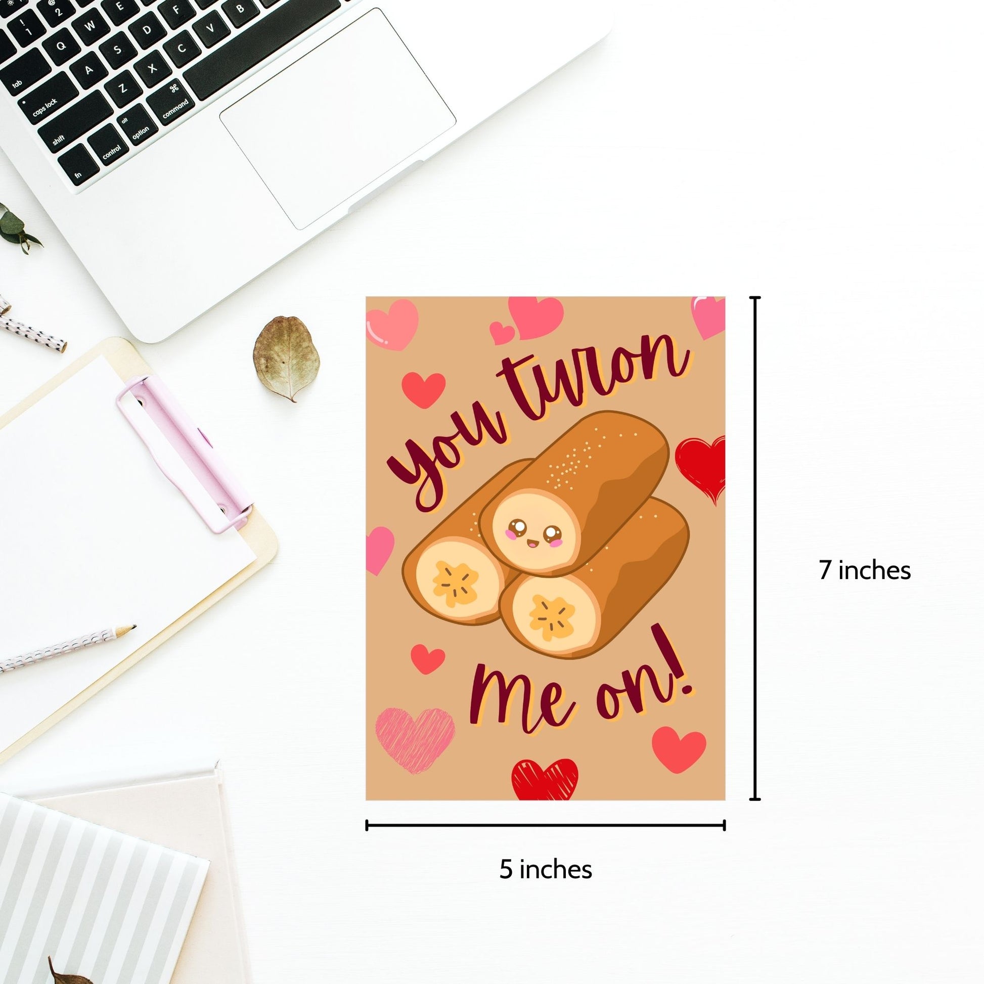 Printable Valentine’s Day card featuring the phrase “You Turon Me On” with an illustration of the Filipino dessert turon. Designed as a 5x7 PDF on an 8.5 x 11 sheet with two cards per page. A punny and culturally inspired Valentine’s card for food lovers.