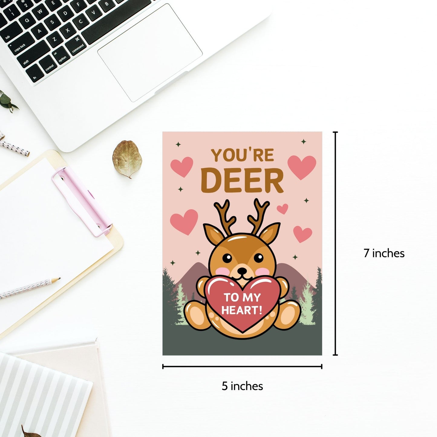 Printable Valentine’s Day Greeting Card featuring the phrase “You’re Deer to My Heart” with a deer illustration. Designed as a 5x7 PDF on an 8.5 x 11 sheet with two cards per page. A heartfelt and punny Valentine’s card for loved ones.