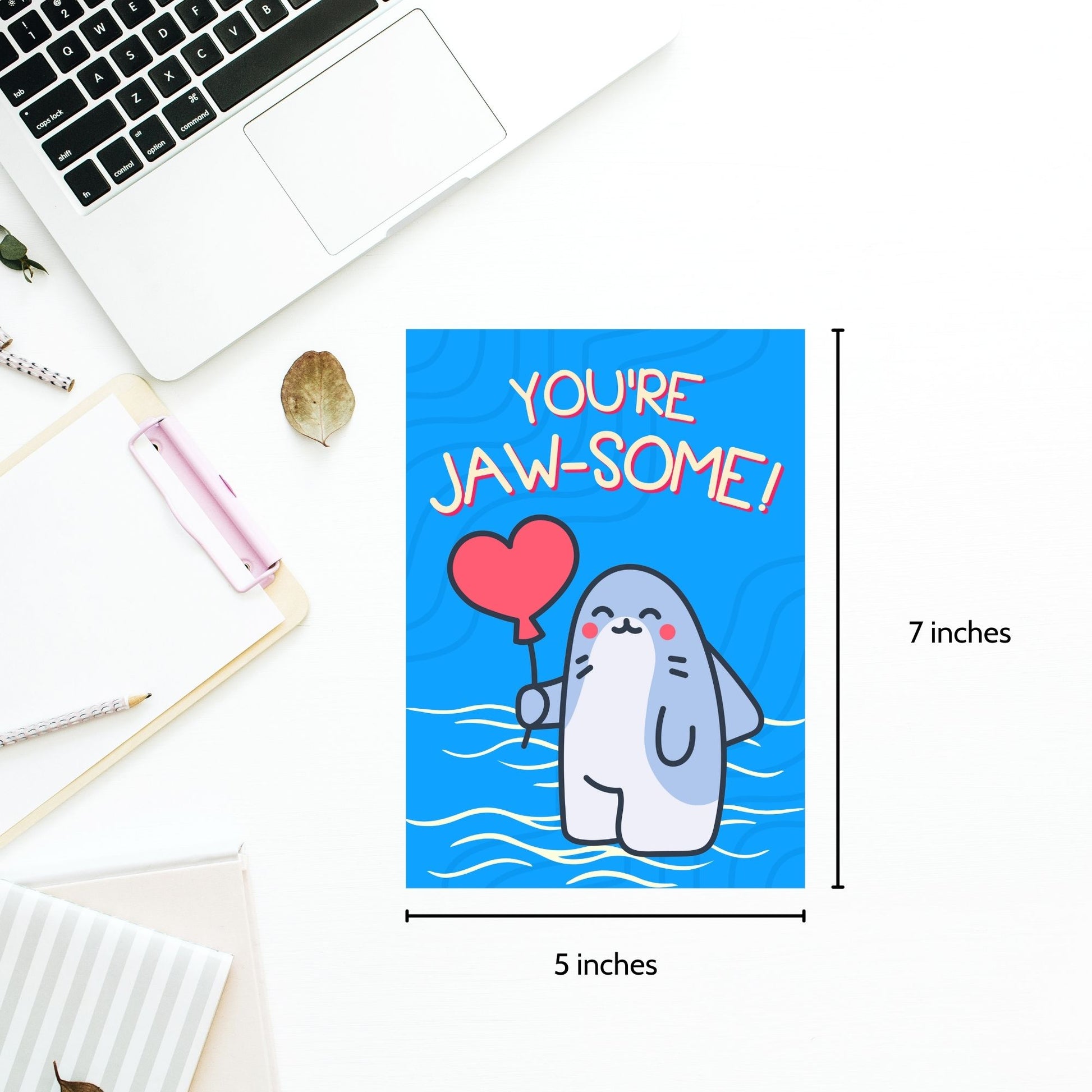 Printable Valentine’s Day Greeting Card featuring the phrase “You’re Jawsome” with a shark theme. Designed as a 5x7 PDF on an 8.5 x 11 sheet with two cards per page. A fun and unique Valentine’s card for shark lovers.