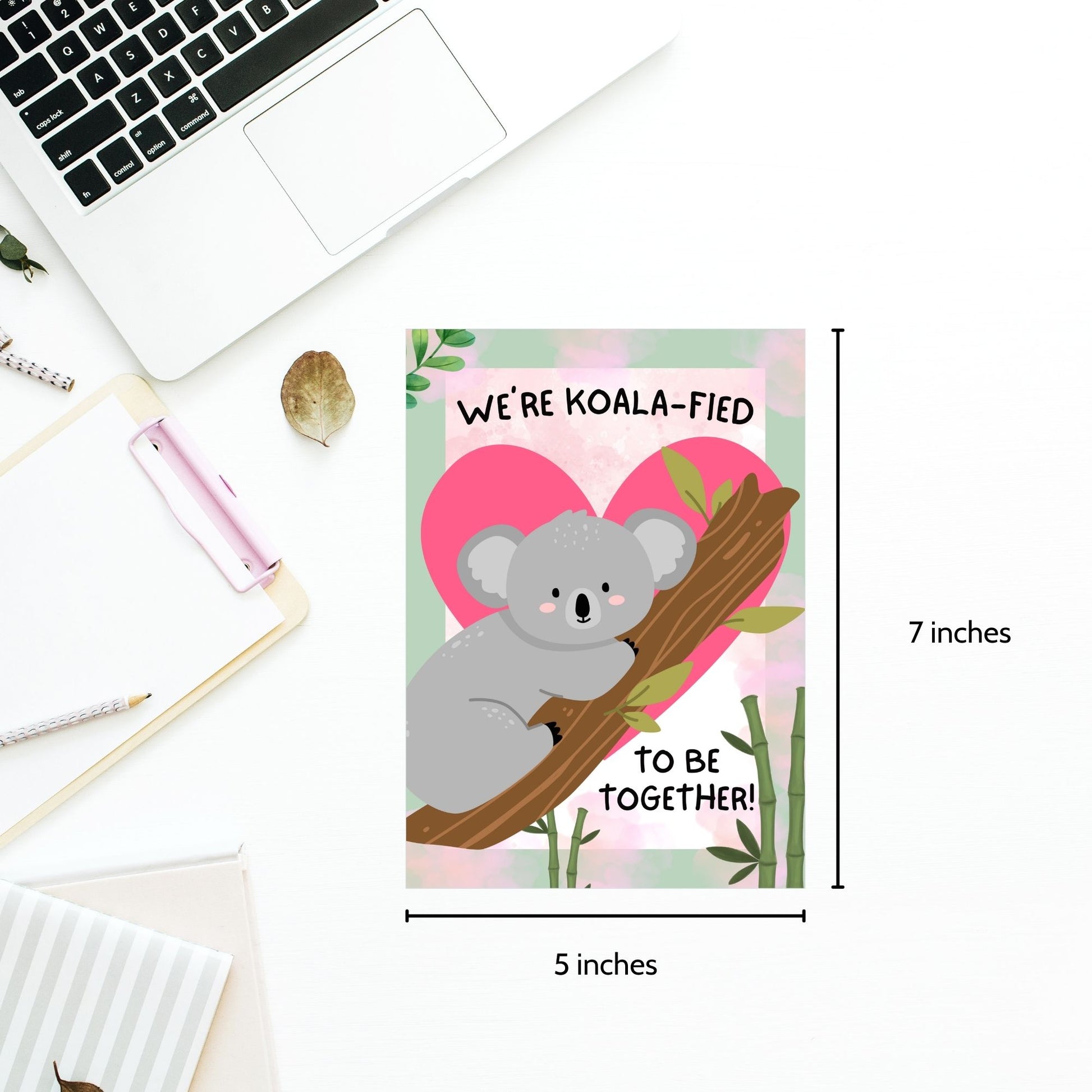 Printable Valentine’s Day Greeting Card featuring the phrase “We’re Koalafied to Be Together” with a koala design. Designed as a 5x7 PDF on an 8.5 x 11 sheet with two cards per page. A cute and punny Valentine’s card for loved ones.