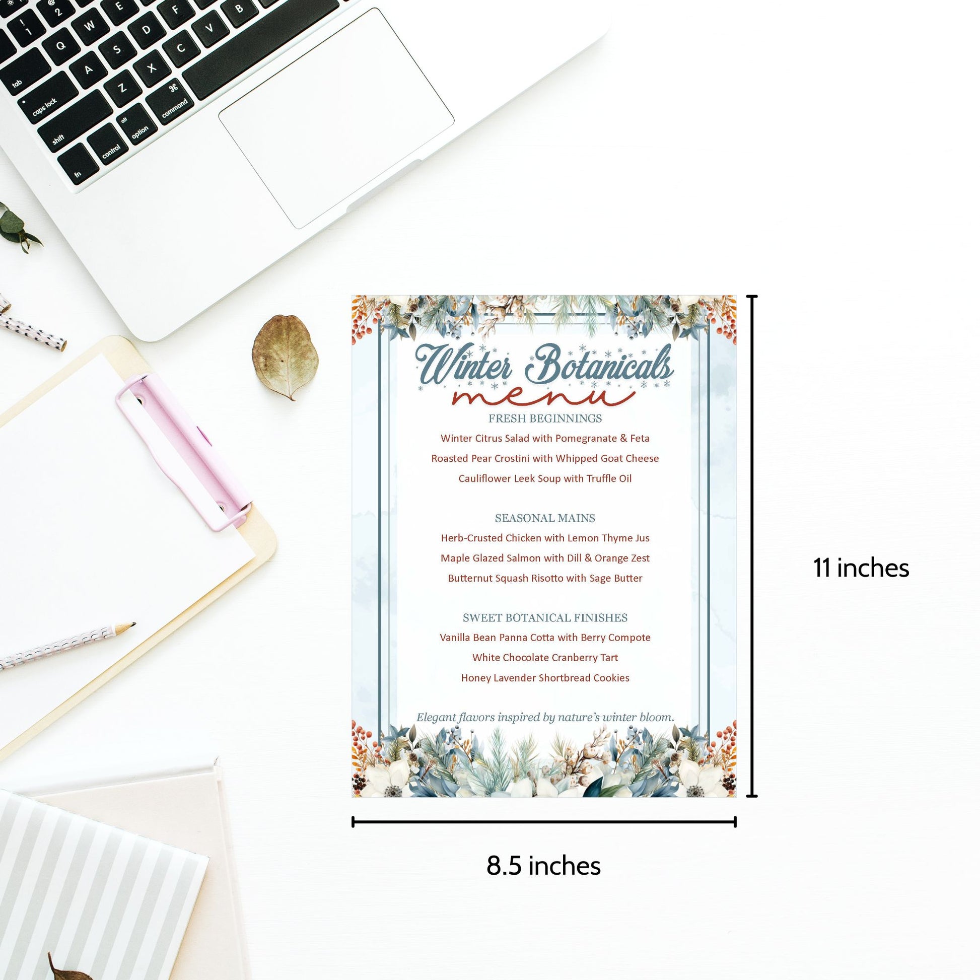 Winter Botanicals menu card on a desk with laptop and stationery items