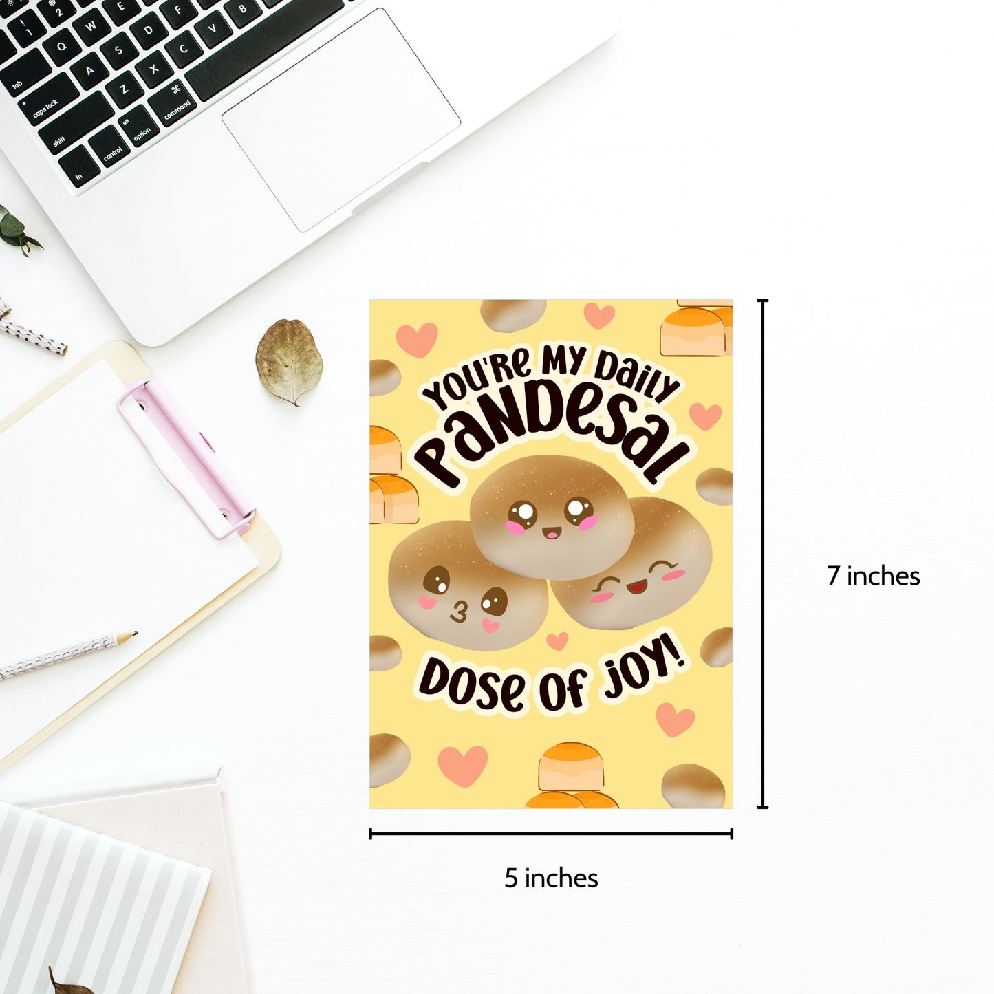 Printable Valentine’s Day card featuring the phrase “You’re My Daily Pandesal Dose of Joy” with a cute and warm pandesal design. Designed as a 5x7 PDF on an 8.5 x 11 sheet with two cards per page. A punny and heartfelt Valentine’s card for Filipino food lovers.