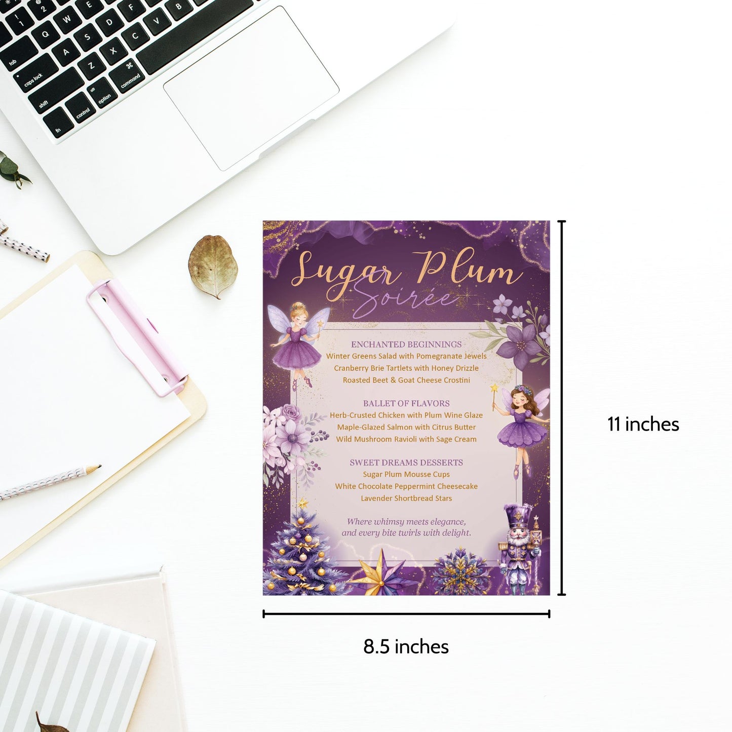 Invitation card for a 'Sugar Plum Soiree' event on a desk with laptop and stationery items.