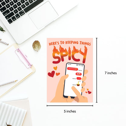 Printable Valentine’s Day Greeting Card featuring the flirty message “Here's to Keeping Things Spicy.” Designed as a 5x7 PDF on an 8.5 x 11 sheet with two cards per page. A fun and cheeky Valentine’s card for couples.