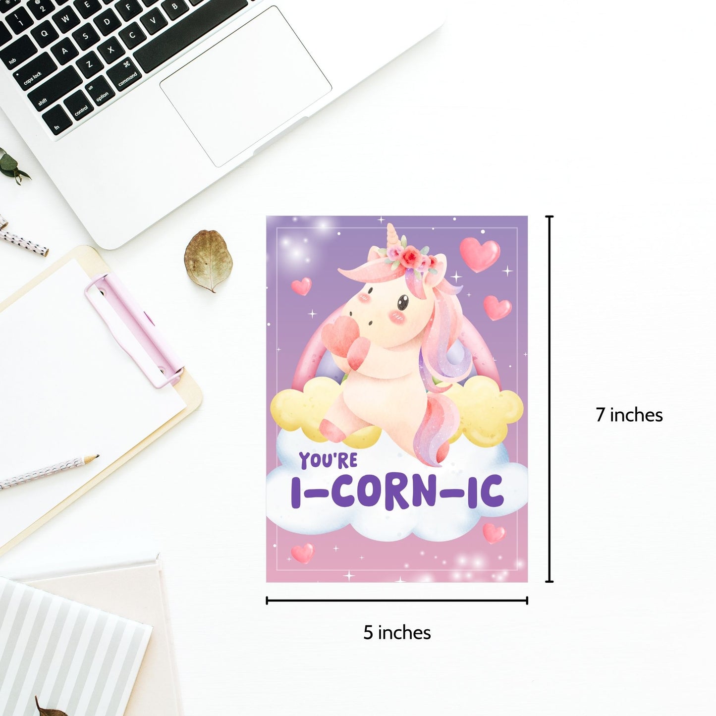 Printable Valentine’s Day Greeting Card featuring the unicorn-inspired pun “You're iCORNic.” Designed as a 5x7 PDF on an 8.5 x 11 sheet with two cards per page. A cute and whimsical Valentine’s card for unicorn lovers.