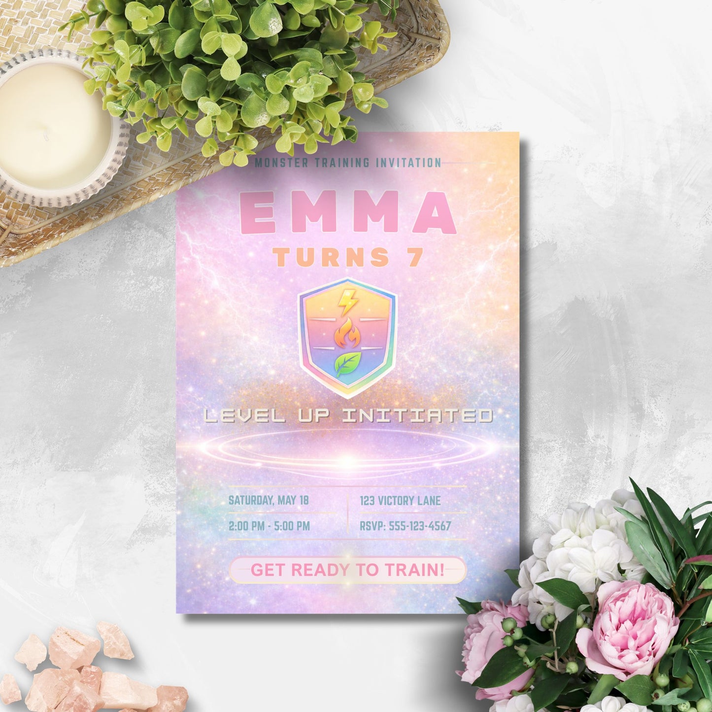 Editable pastel rainbow monster trainer inspired birthday invitation with soft glowing arena, cute badge design, and customizable party details in Canva