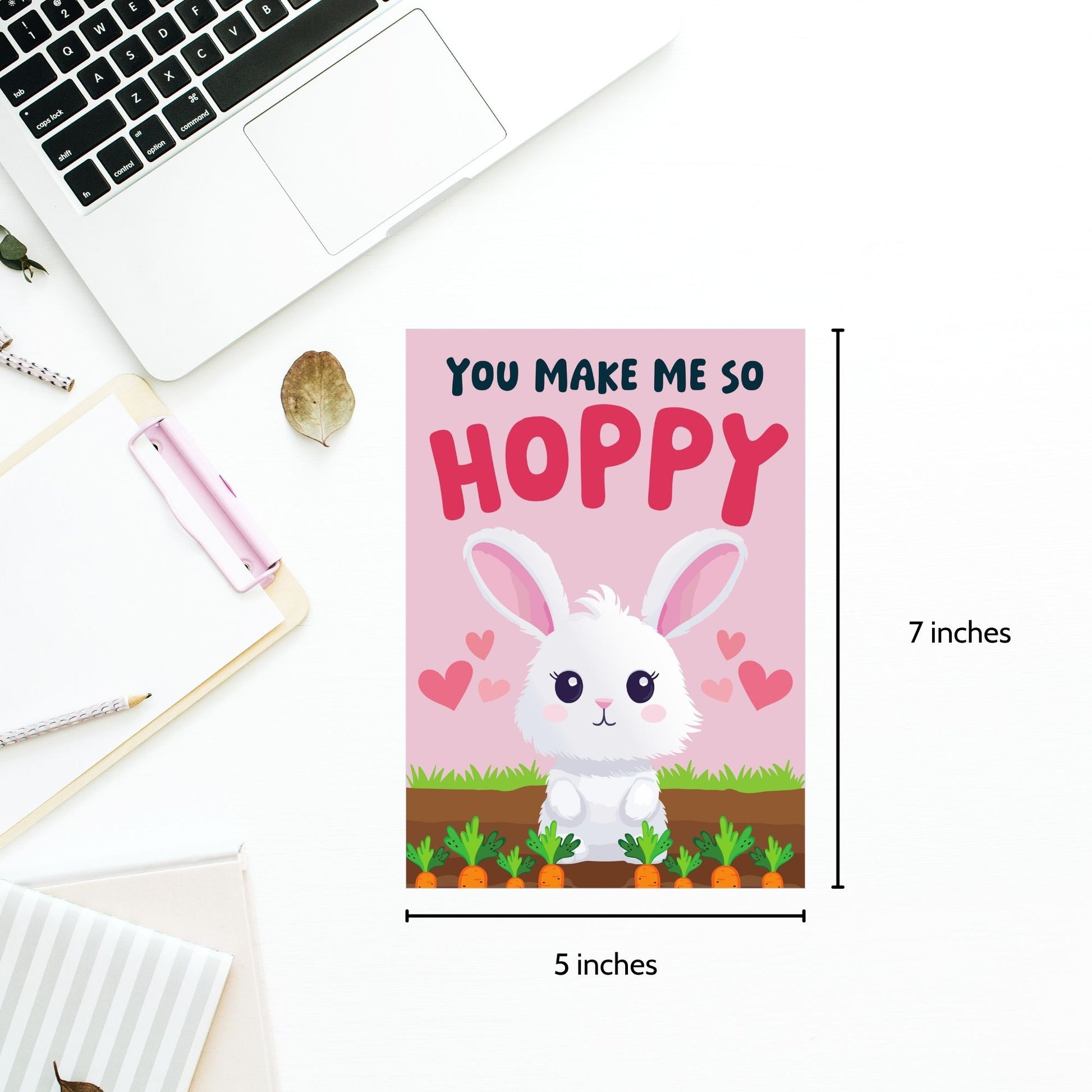 Printable Valentine’s Day Greeting Card featuring the pun “You Make Me So Hoppy.” Designed as a 5x7 PDF on an 8.5 x 11 sheet with two cards per page. A fun and cute Valentine’s card for bunny lovers.