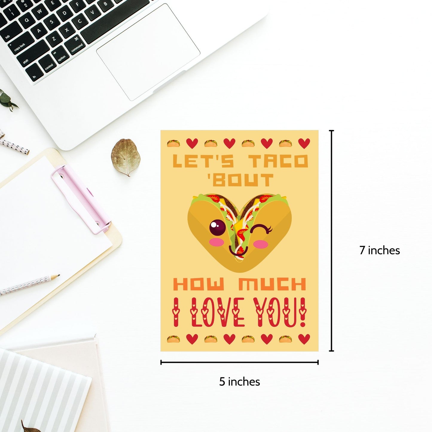 Printable Valentine’s Day Greeting Card featuring the phrase “Let’s Taco ‘Bout How Much I Love You” with a taco theme. Designed as a 5x7 PDF on an 8.5 x 11 sheet with two cards per page. A fun and punny Valentine’s card for taco enthusiasts.