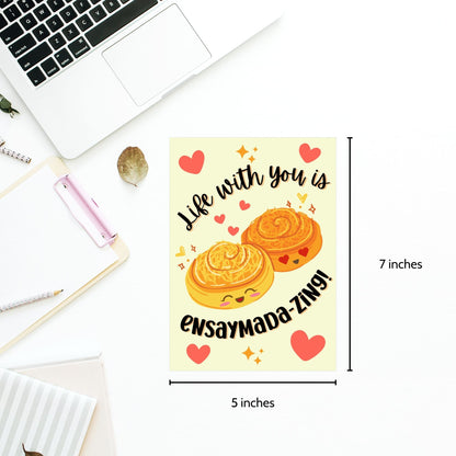 Printable Valentine’s Day card featuring the phrase “Life with You is Ensaymadazing” with a Filipino ensaymada-inspired design. Designed as a 5x7 PDF on an 8.5 x 11 sheet with two cards per page. A punny and heartfelt Valentine’s card for Filipino food lovers.