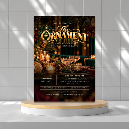 A vertical holiday dinner party invitation card displayed upright on a round white pedestal with a light wood top, set against a white tiled wall with soft window shadows.