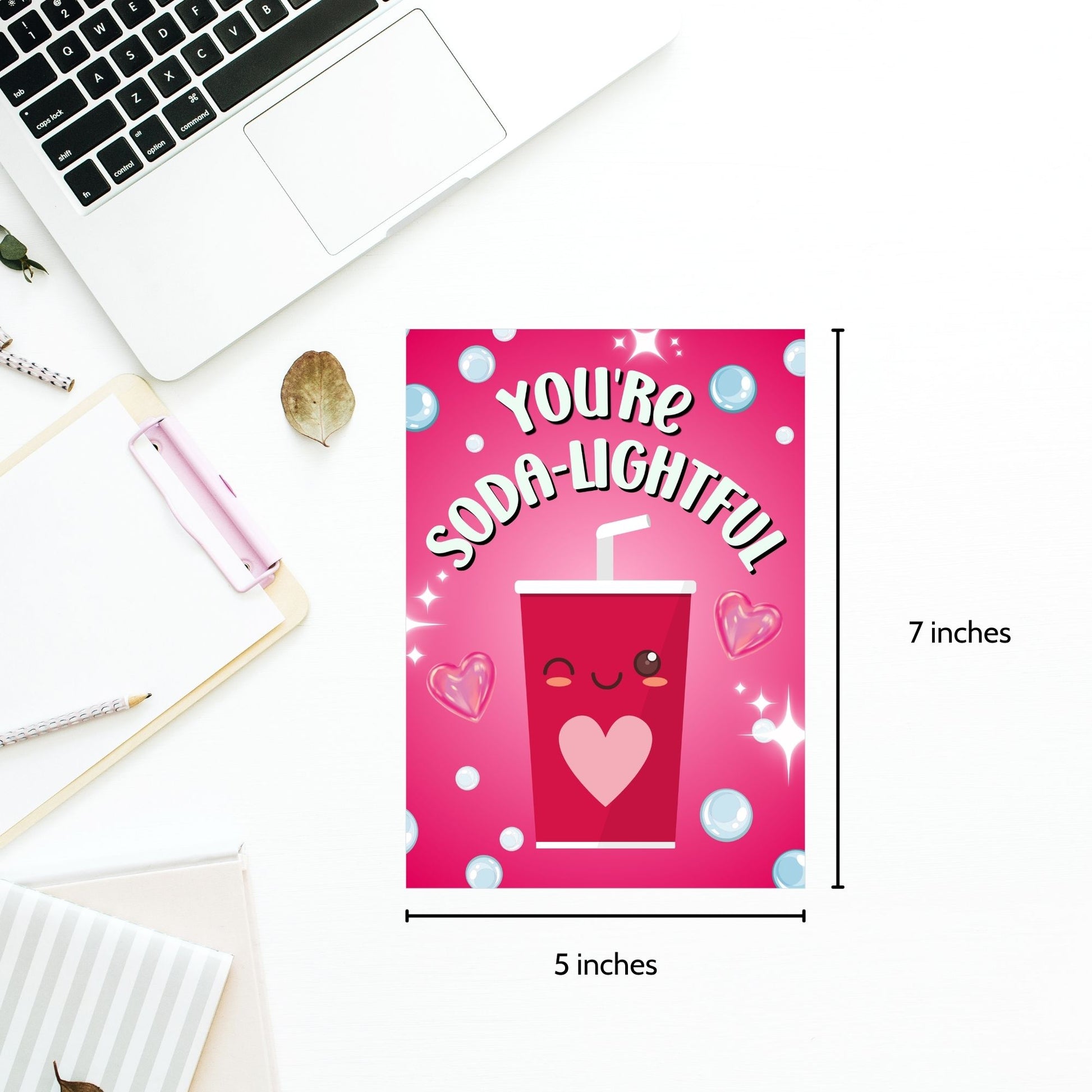 Printable Valentine’s Day Greeting Card featuring the phrase “You’re Soda-lightful” with a soda bottle illustration. Designed as a 5x7 PDF on an 8.5 x 11 sheet with two cards per page. A bubbly and pun-filled Valentine’s card for loved ones.