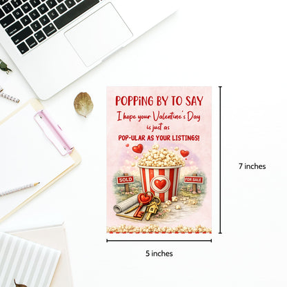 Printable popcorn Valentine’s Day card for realtors featuring a popcorn bucket, real estate signs, keys, and the phrase “Pop-ular as Your Listings,” designed as a client appreciation gift.