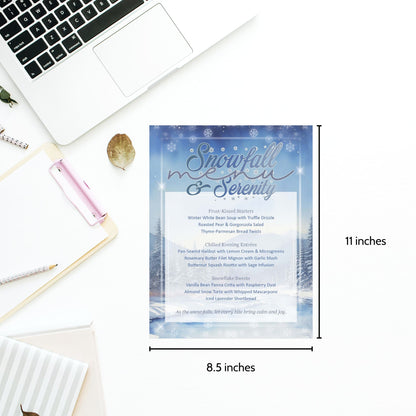 Menu with 'Snowfall & Serenity' design on a desk with laptop and stationery items.