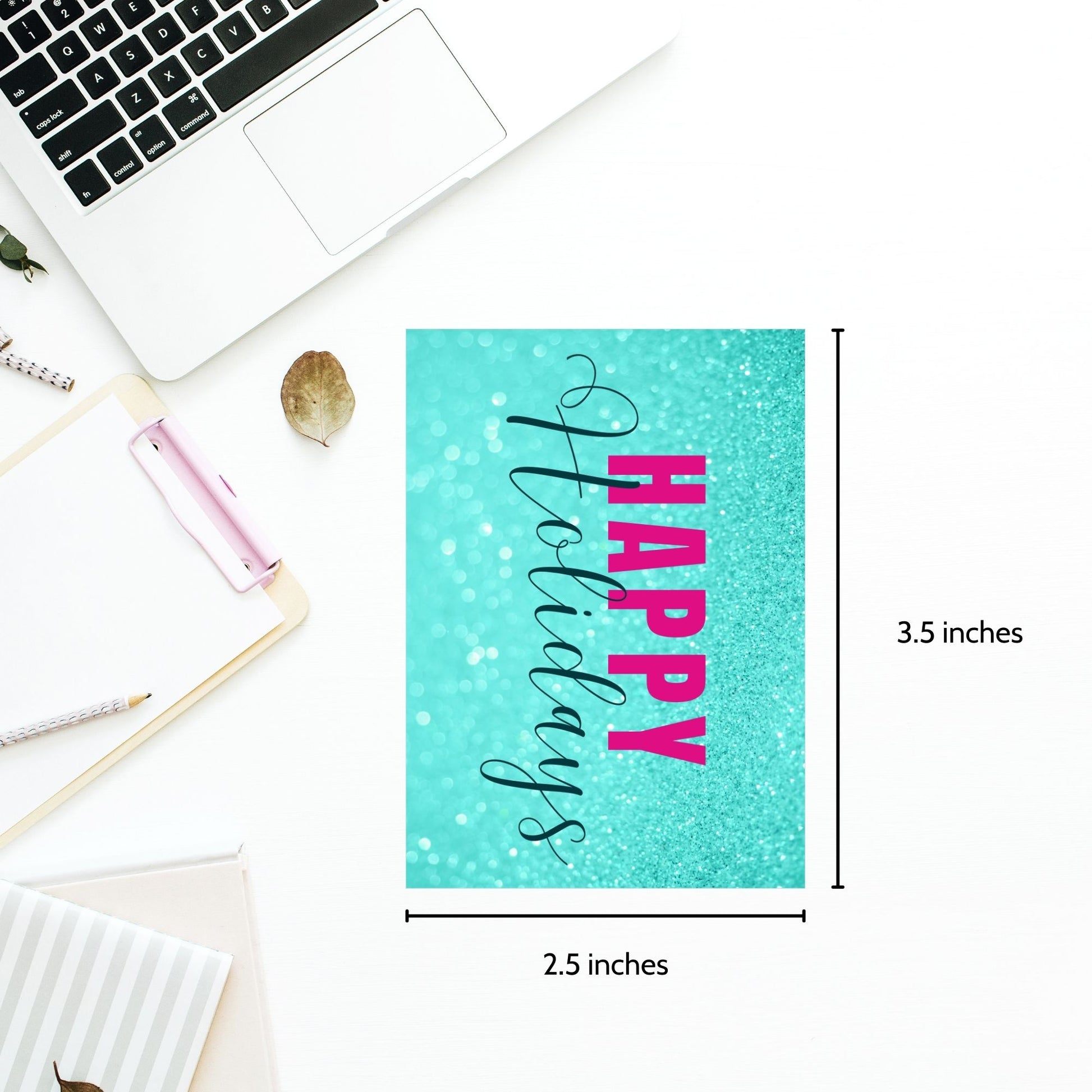 Printable Holiday gift tags featuring an aqua glitter background with bold magenta "Happy Holidays" text and black script accents, sized 2.5 x 3.5 inches, 8 tags per sheet.