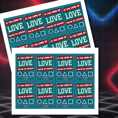 Game-inspired printable Valentine’s Day gift tags with the message "In the Game of Love, You’re My Winner!" featuring gaming-themed icons and customizable name options. Perfect for gamers and Valentine gifting.