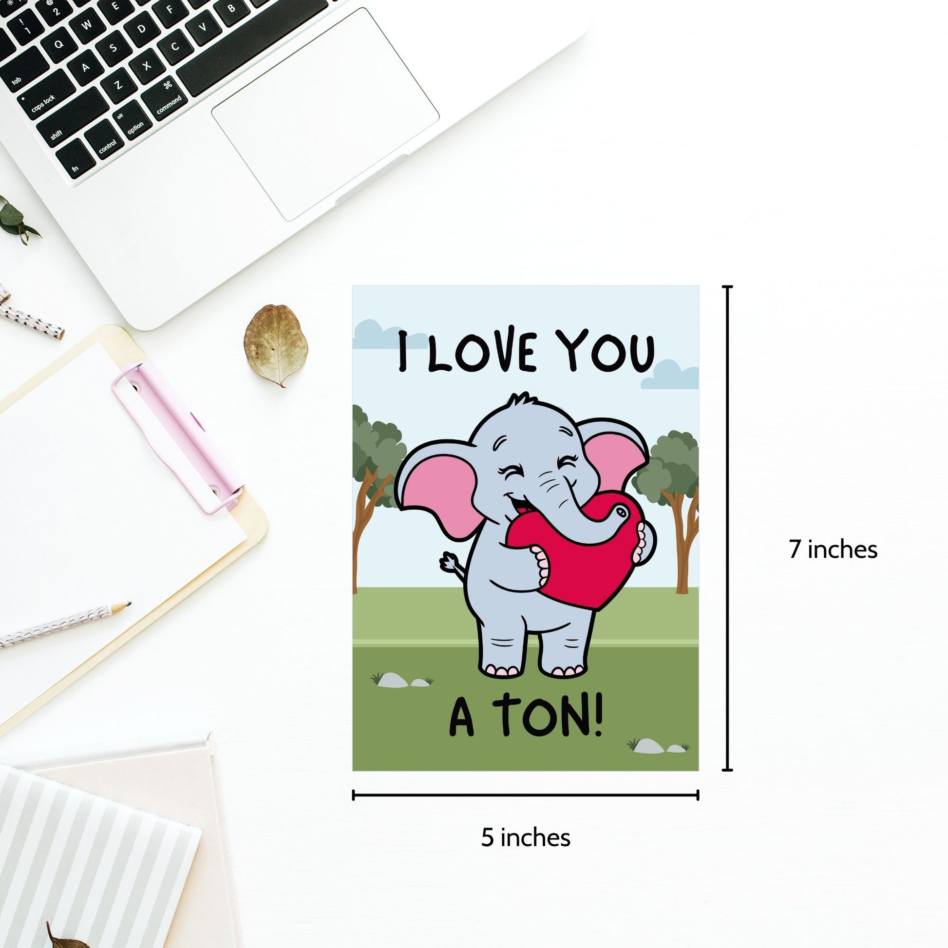 Printable Valentine’s Day Greeting Card featuring the phrase “I Love You a Ton” with an elephant theme. Designed as a 5x7 PDF on an 8.5 x 11 sheet with two cards per page. A cute and heartfelt Valentine’s card for loved ones.