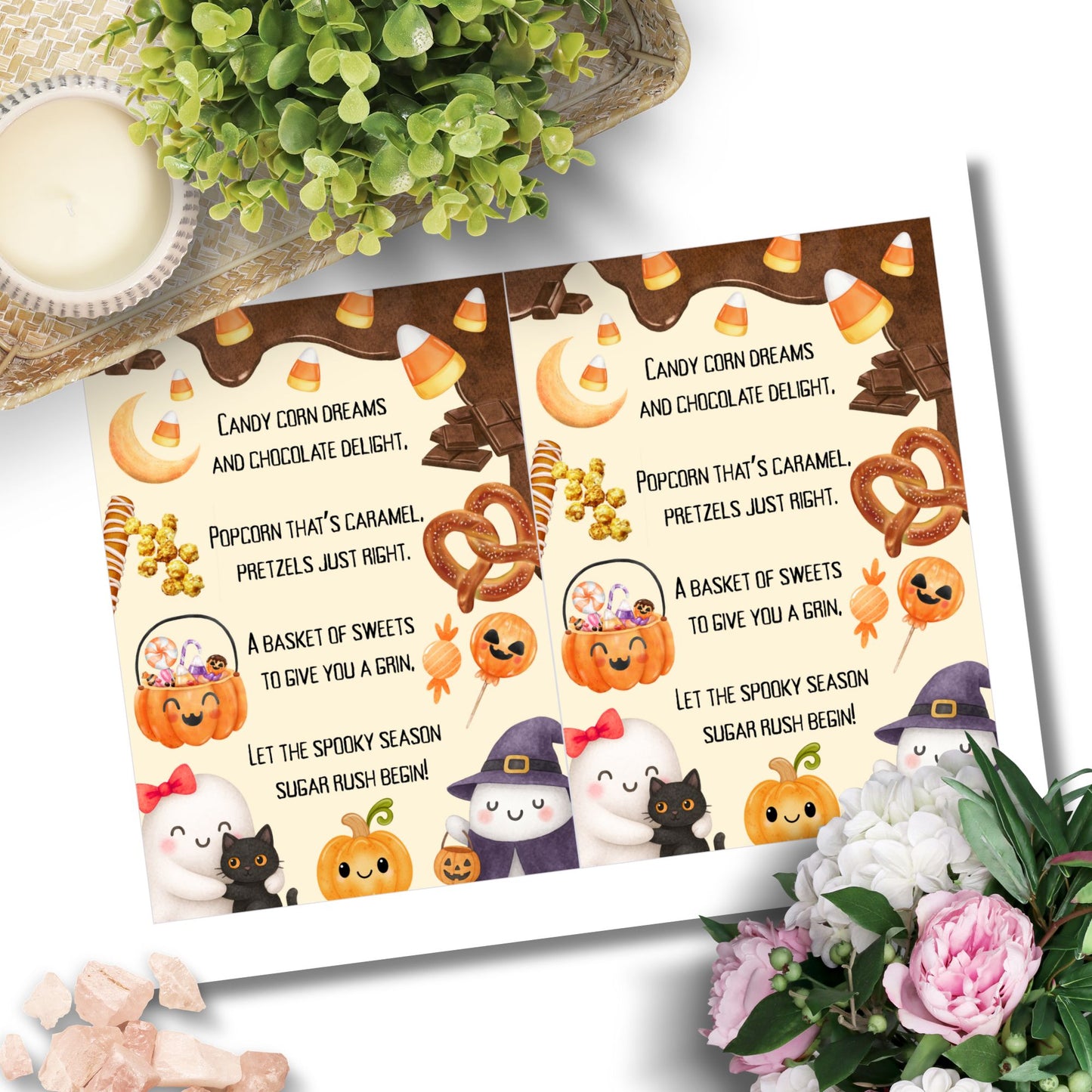 Halloween-themed placemat with candy illustrations and text on a white surface with flowers and a bowl.
